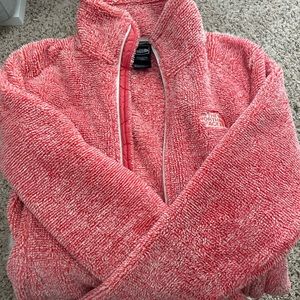 The North Face zip up jacket.